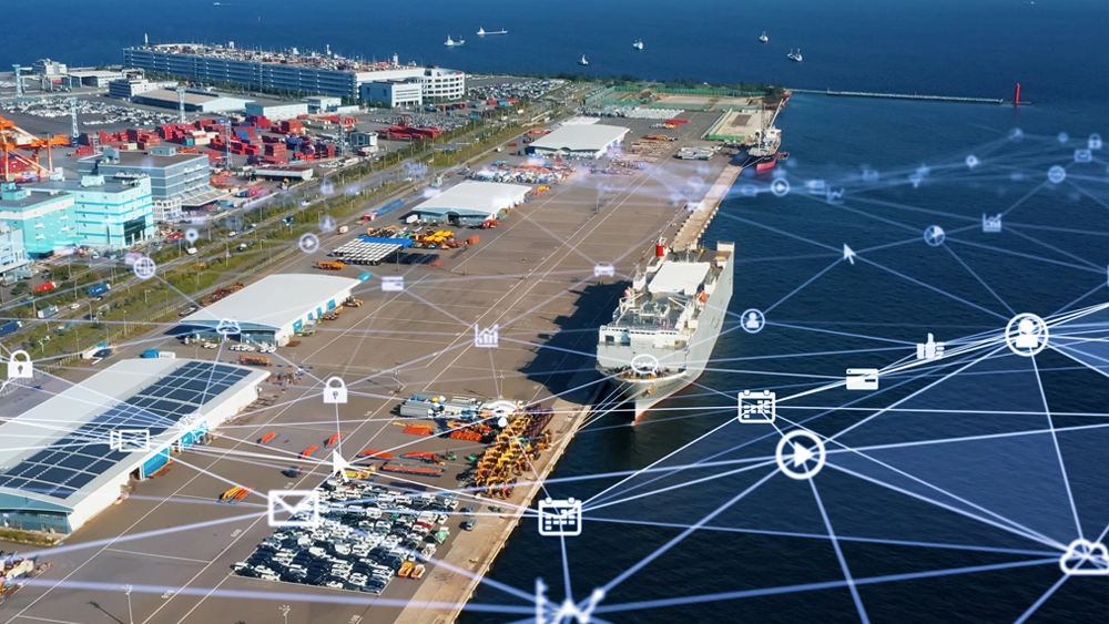 Image of ship moored at docks with graphics over the top representing technology and connectivity, logistics 
