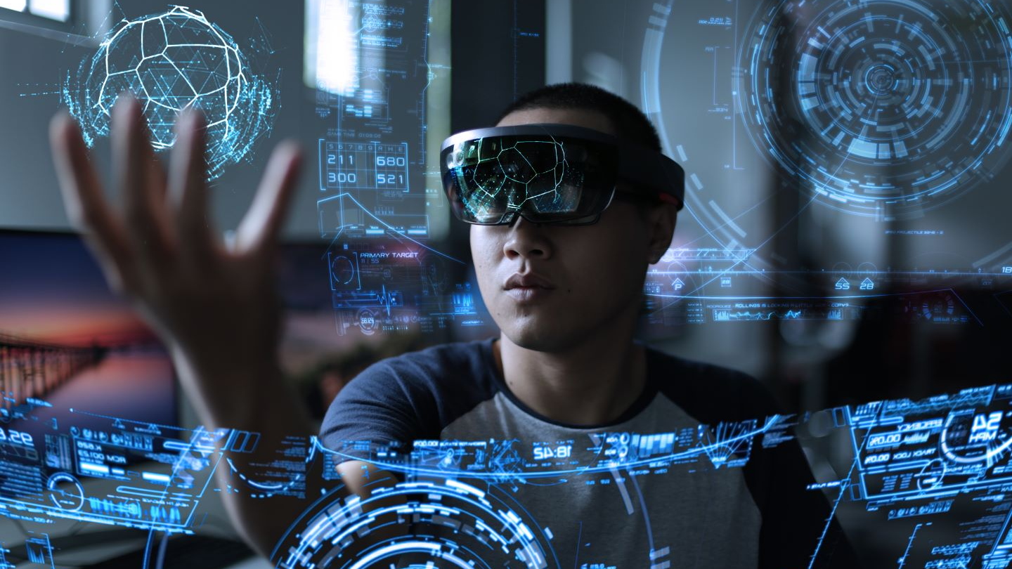 Man using virtual reality (VR) glasses with precision optics advanced materials and technologies