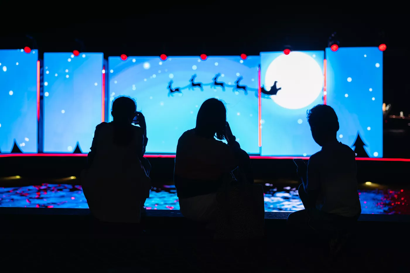 Christmas graphic on outdoor stage