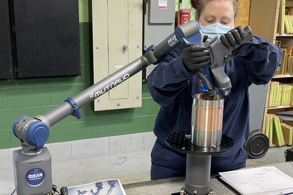 Materion employee testing copper material