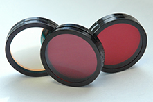 Three round astronomical optical filters