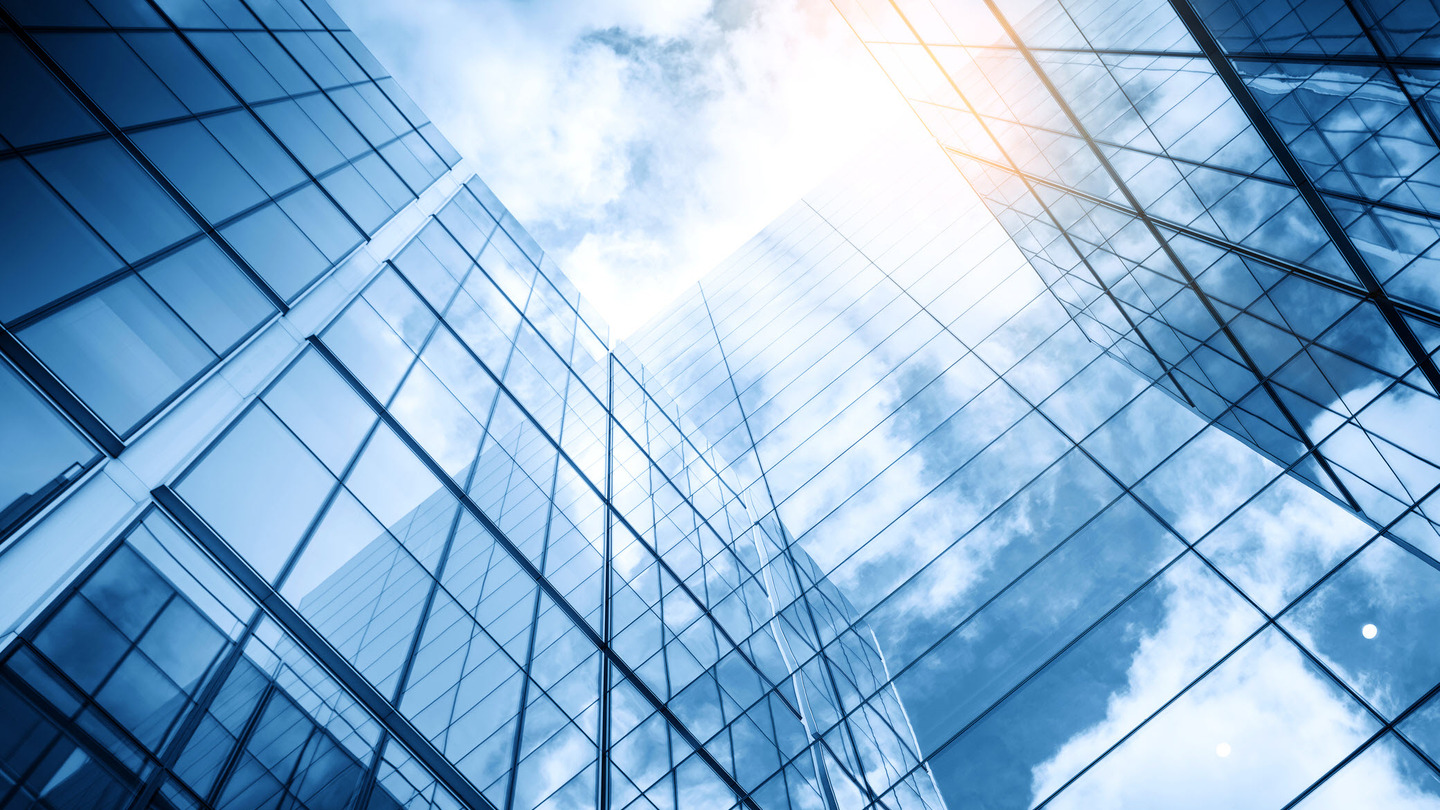 Glass buildings that use thin film coatings