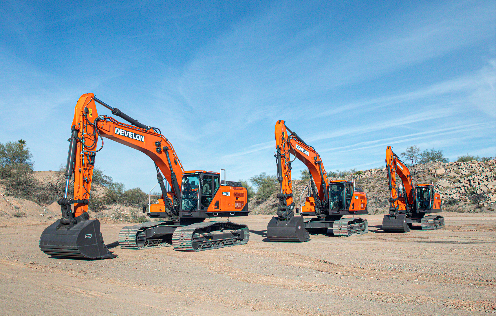 Three of the new DEVELON -9 Series crawler excavators.