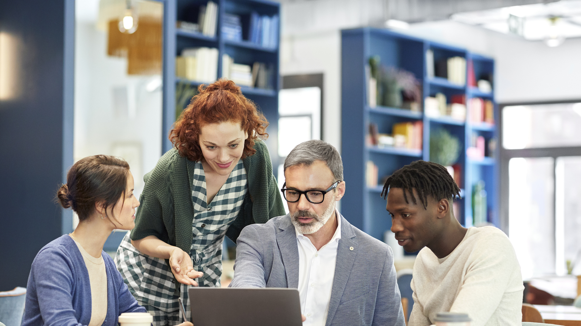 Multi-ethnic coworkers planning strategy in office