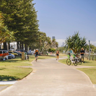 A path with people walking and riding bikes on the Miami esplanade