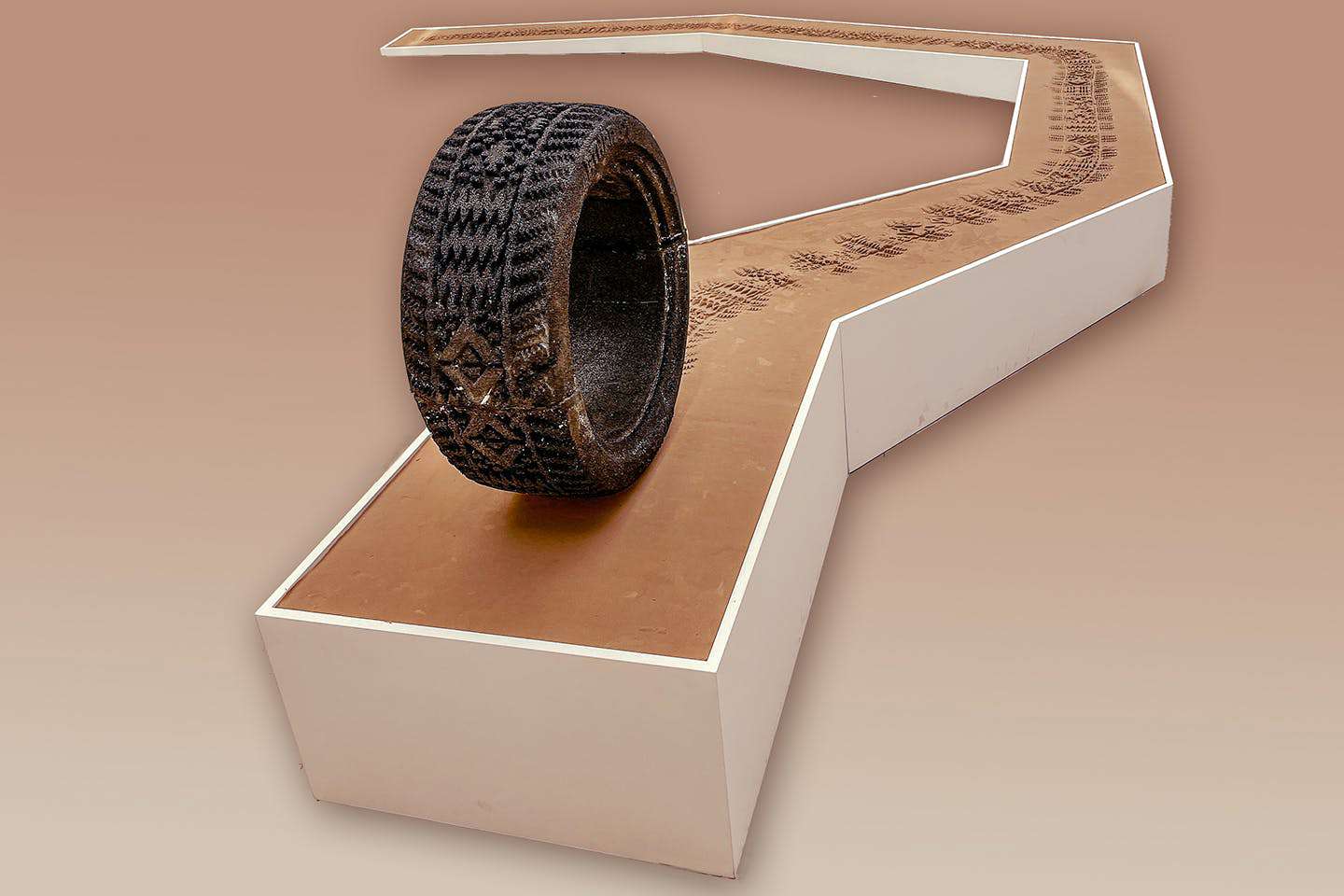 A tire patterned with traditional Kuwaiti textile designs.