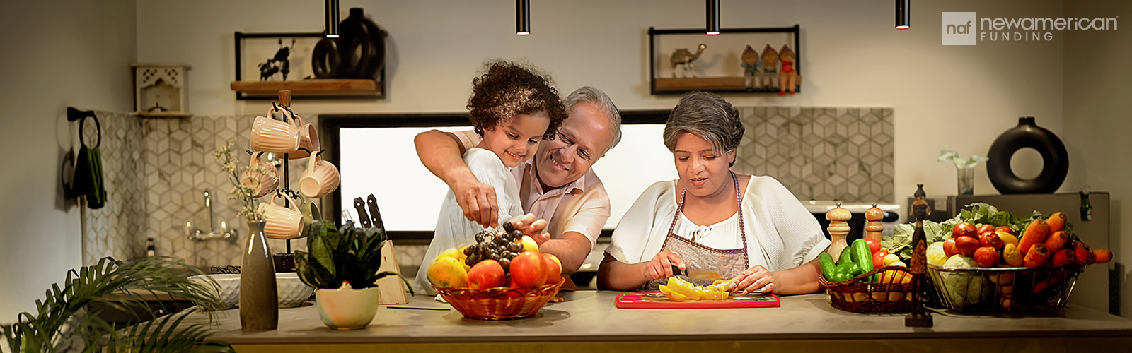 Grandparents cook with their grandchild in a nice kitchen