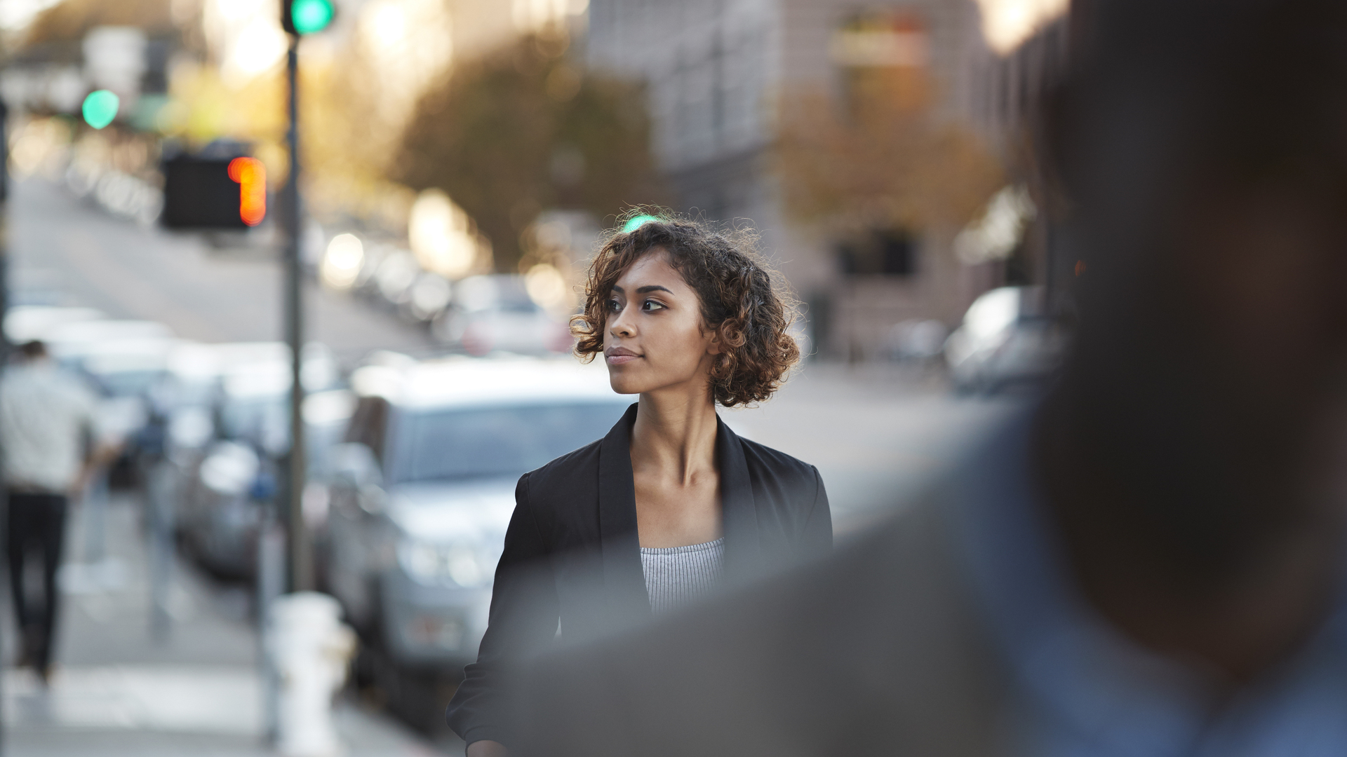 Businesspeople walking in pedestrian crossing