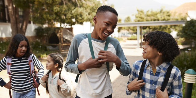 School friends walking to school