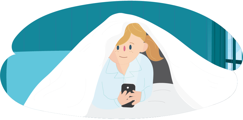 A child sitting under a blanket while holding a mobile phone.