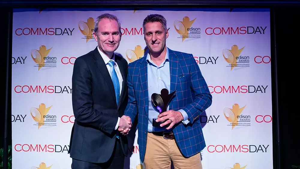 Picture of Andrew Wildblood, Former Chief Executive, Enterprise & Government, Vocus accepting the award for Best Enterprise Telco at the Comms Day Edison Awards 2024