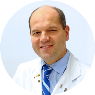 A professional headshot of Enrique Ocio, MD, PhD.