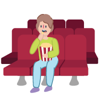 Person sitting in a cinema eating popcorn