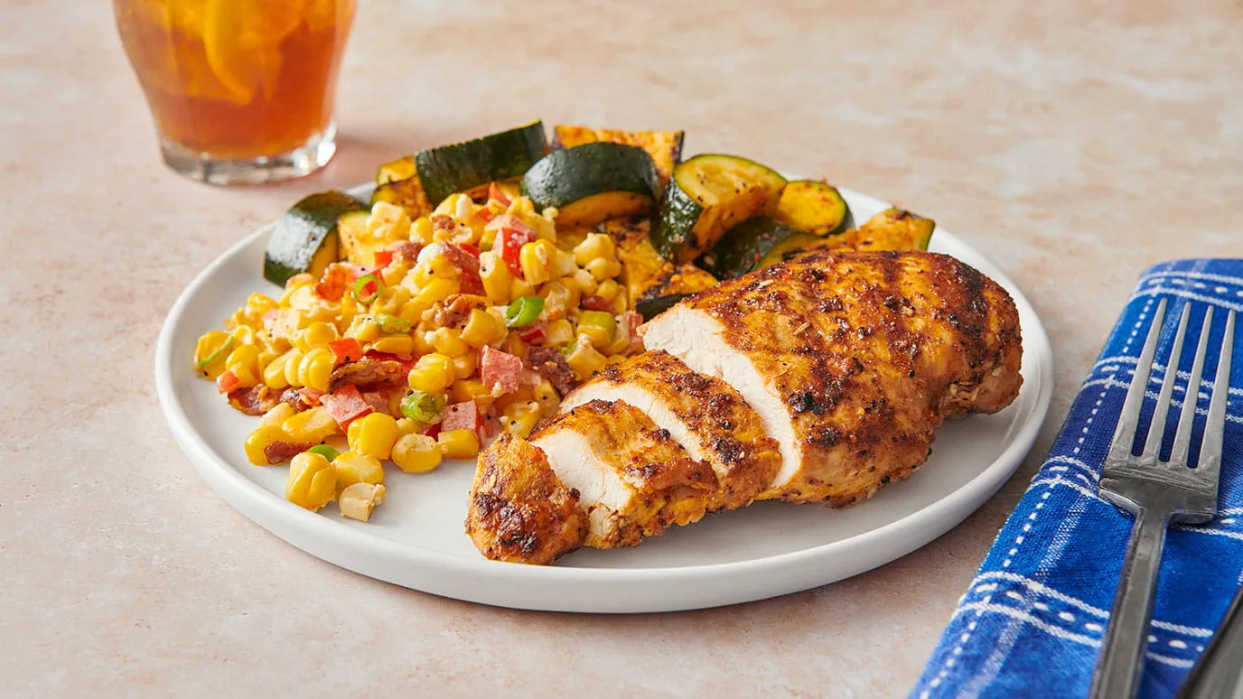 Plate of Grilled Italian Chicken and Corn Salad