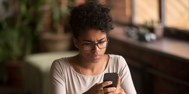 Person Holding Phone