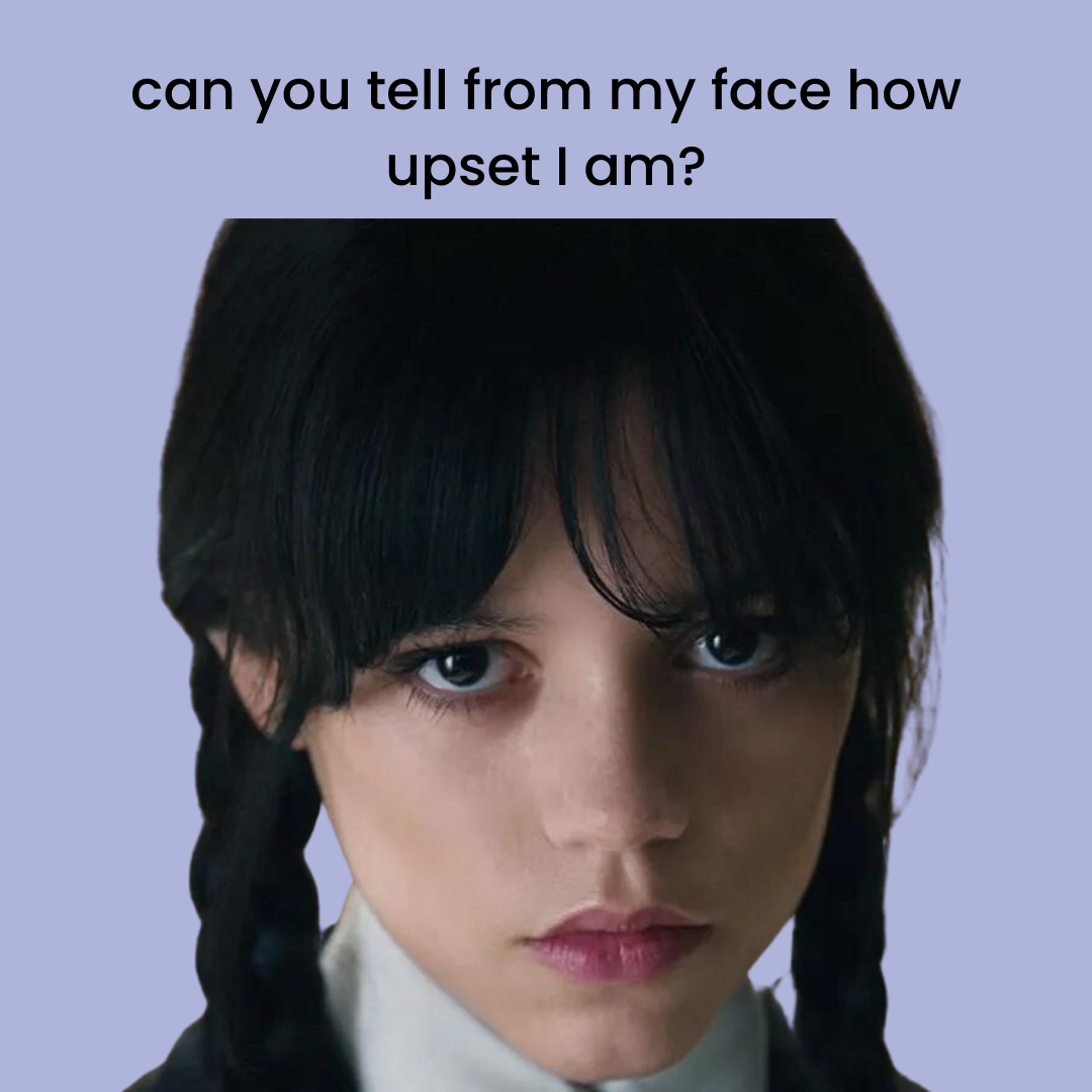 A photograph of a person’s face with a blank expression, with text above that reads: “can you tell from my face how upset I am?”