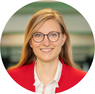 Professional headshot of Carolin Schneider.