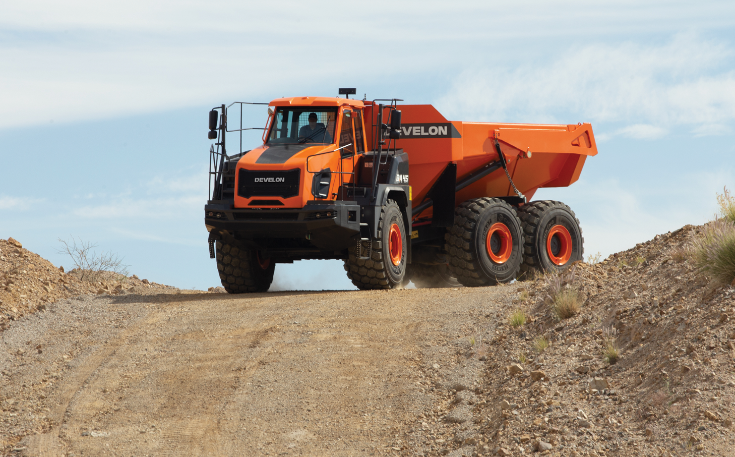 DEVELON ADT maintains ground contact with all 6 tires on a jobsite.