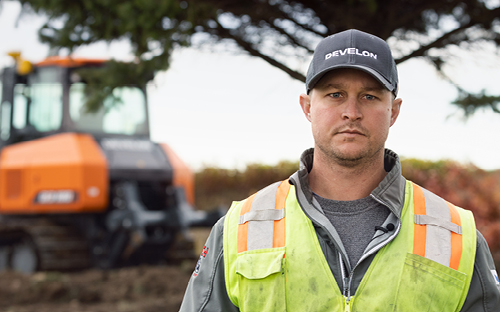 DEVELON  dealer provides service on the jobsite.