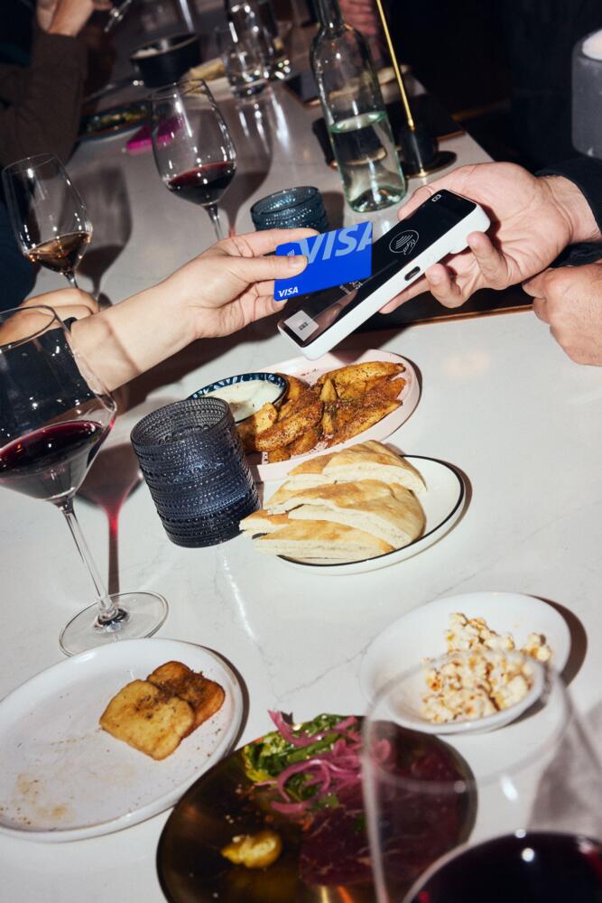 Square Handheld taking payments at Roaming Goat