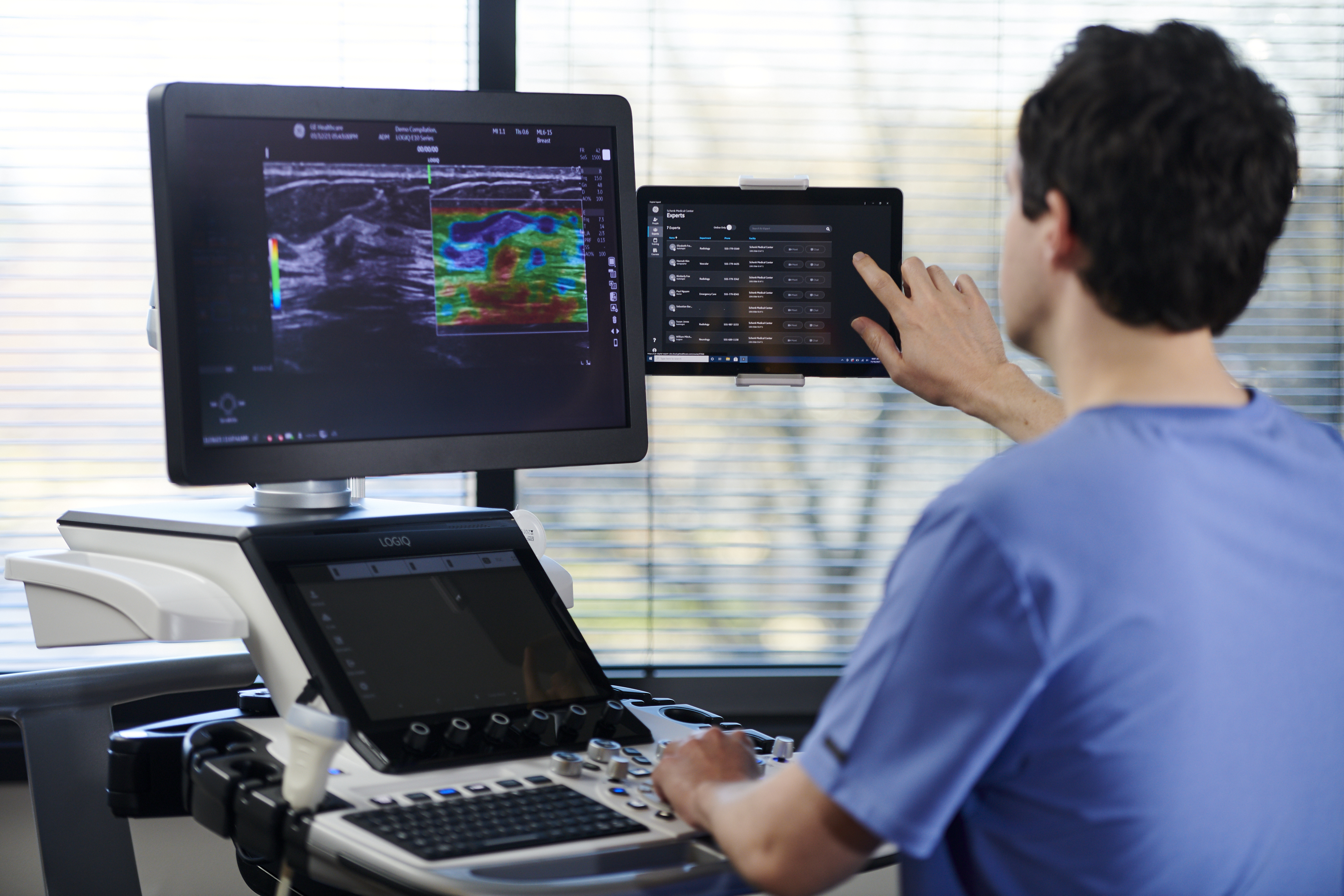 A sonographer used Verisound Collab, available as an ultrasound software subscription, while sitting at an ultrasound machine.
