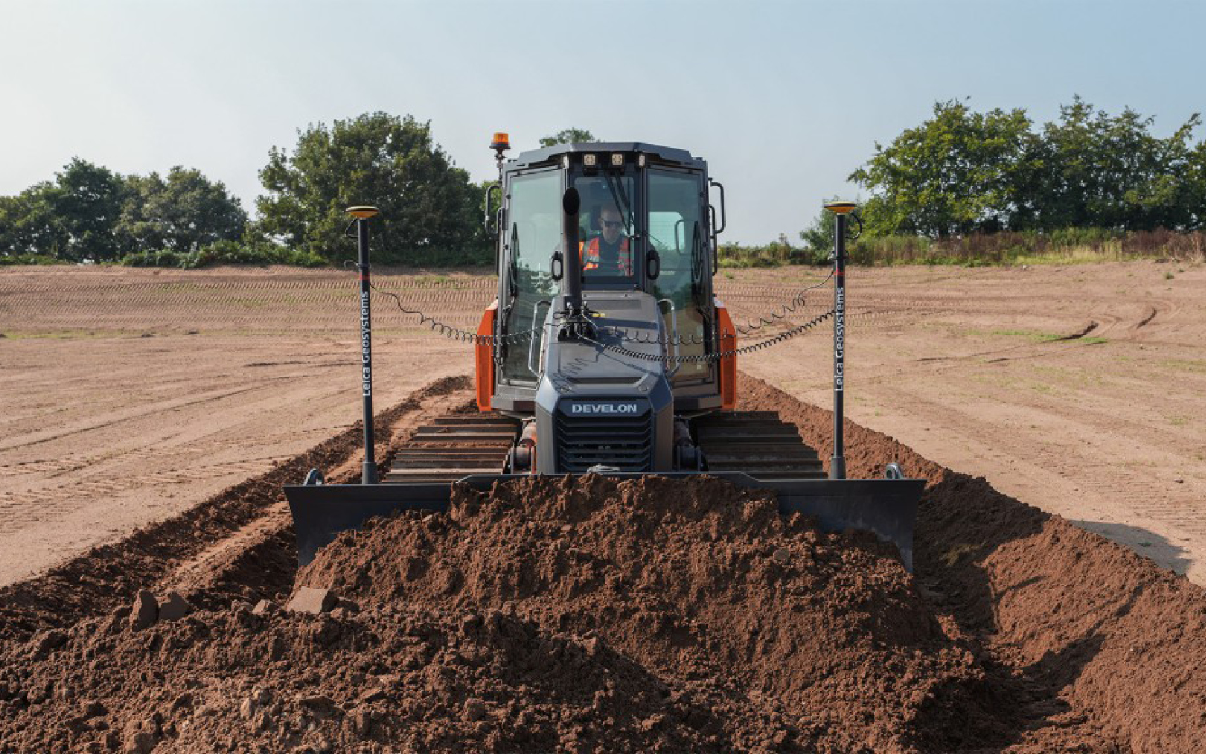 A DEVELON dozer outfitted with a 3D machine control system.