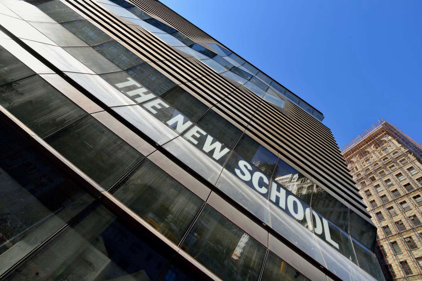 A photo from the sidewalk looking up at the University Center.