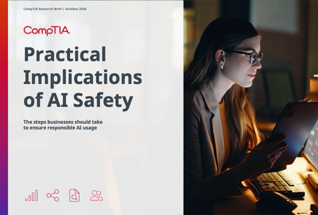 CompTIA Research Brief cover: Practical Implications of AI Safety featuring a woman working on a tablet at night