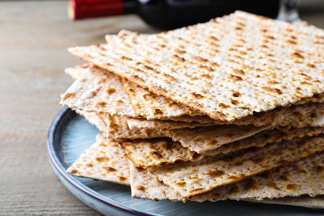 <p>Liudmila Chernetska / Getty Images</p> Used on the seder plate and during the seder, matzo functions as a substitute for bread during the holiday.