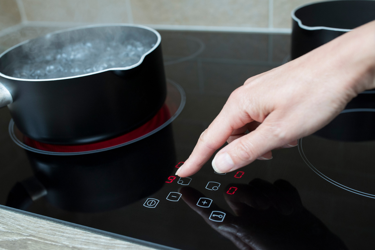 Alloy 360 high heat stovetop controls with hand pushing buttons