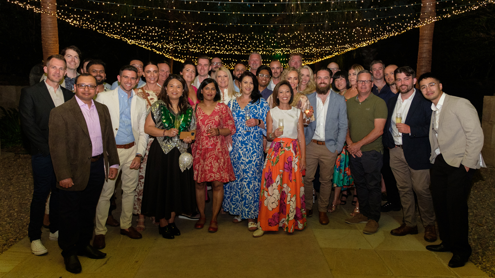 A photo of Roy Chan and the Vocus team
