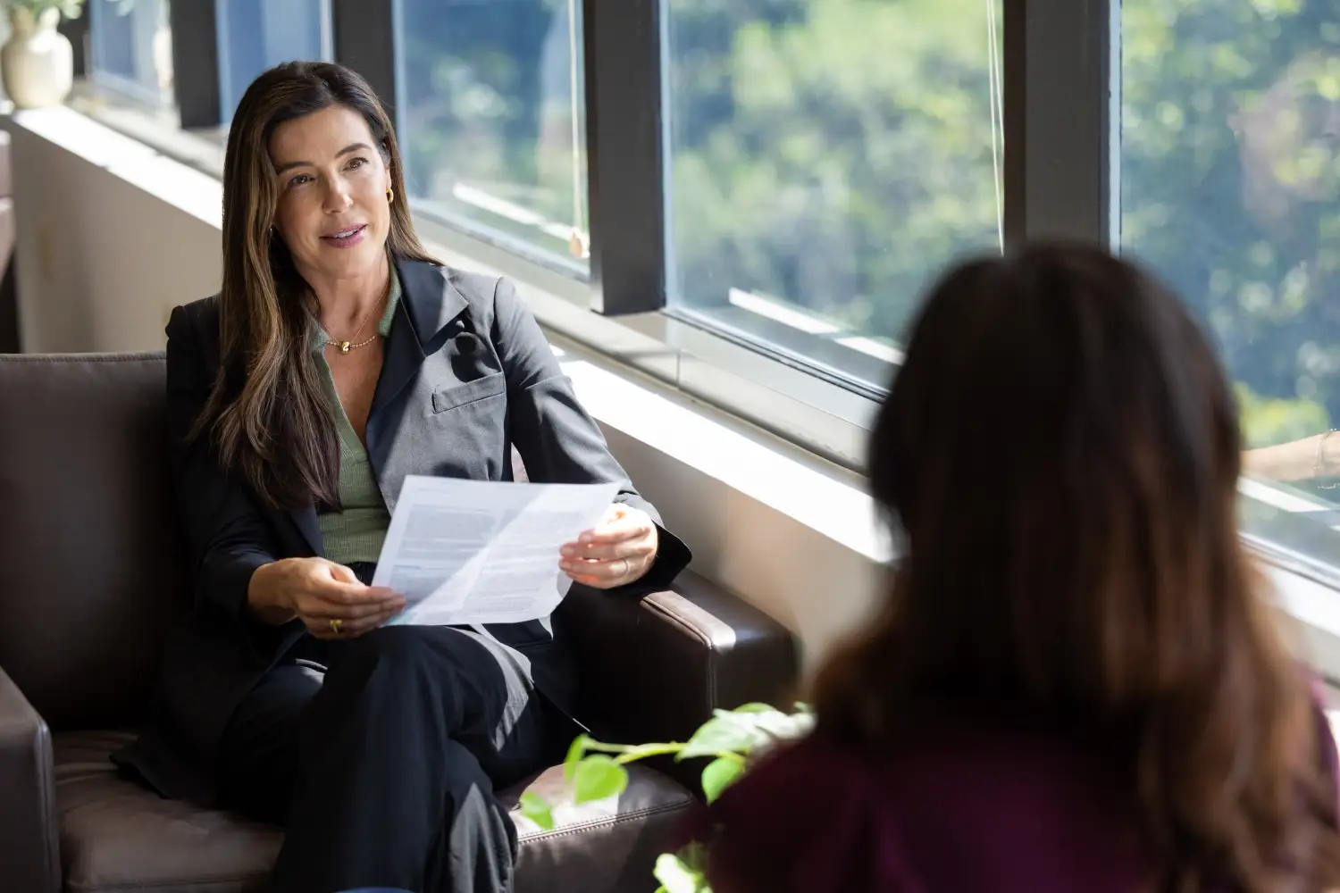 Finance team discussing statutory financial reports generated from Certinia cloud accounting software