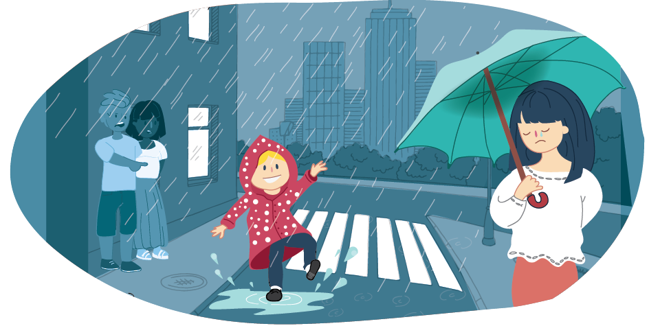 A child jumping in a puddle and smiling while another child stands nearby holding an umbrella looking sad.