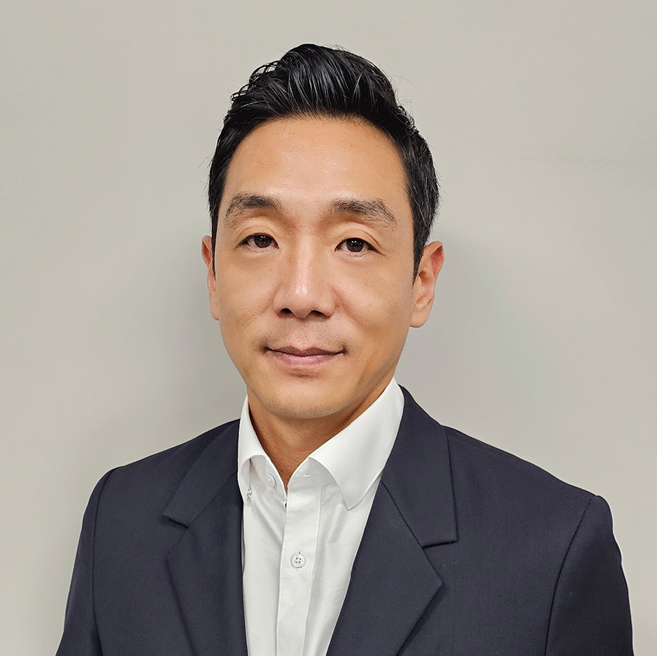 Headshot of Woohyun Kim, CEO at DEVELON North America.