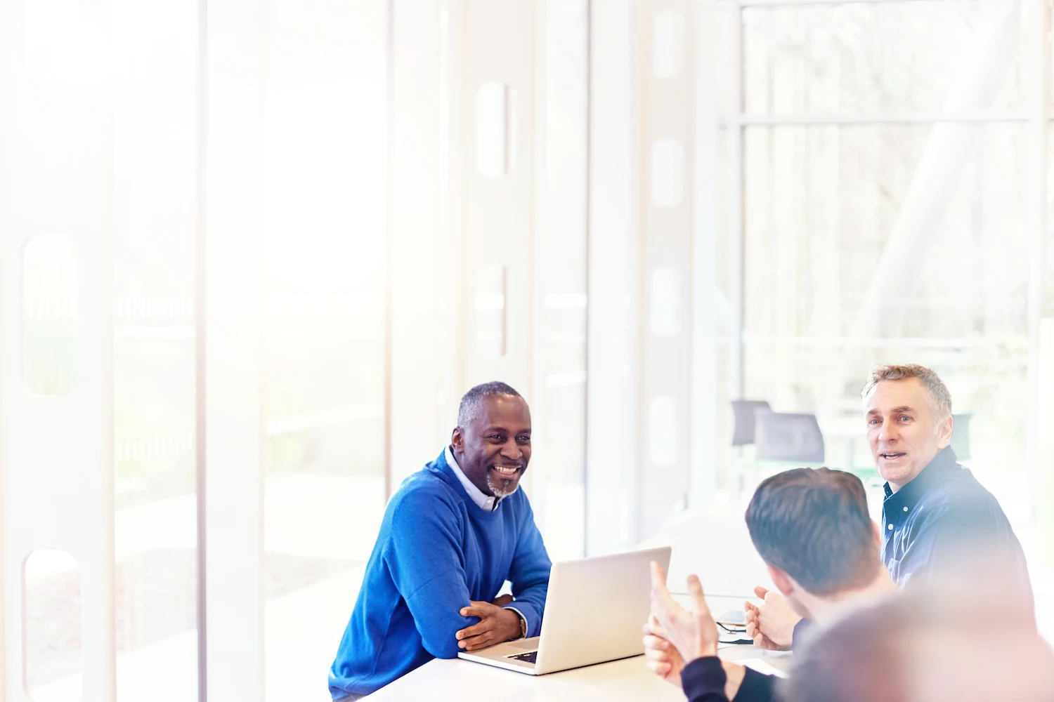 Three finance leaders discussing the disconnect between siloed departments