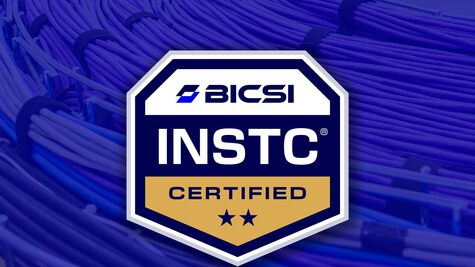 BICSI INSTC credential badge over blue cable background overlay