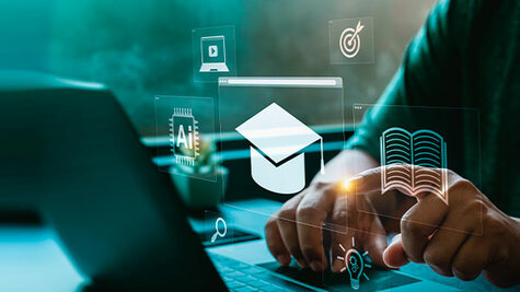 Hands typing on a laptop surrounded by glowing digital icons of a graduation cap, open book, and AI concept