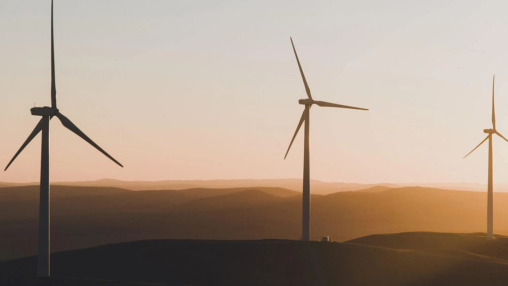 Photo of Wind turbines at dusk