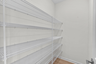 walk in pantry with wire shelves