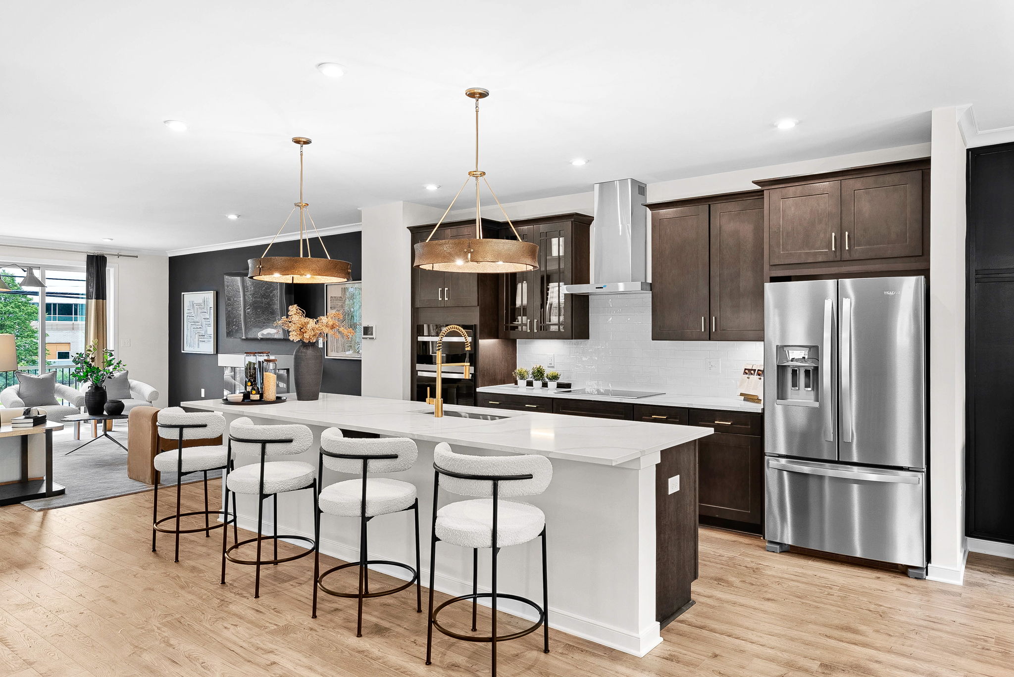 kitchen with center island adjacent to great room