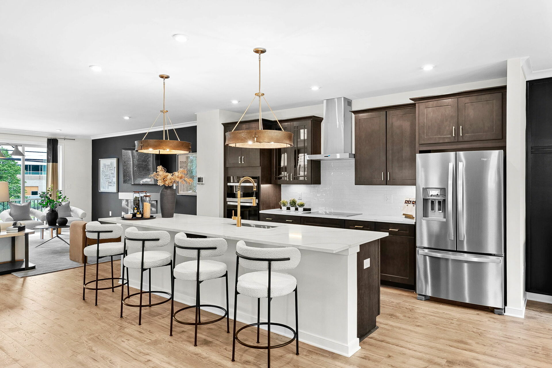 kitchen with center island adjacent to great room