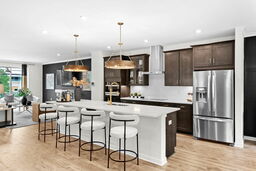 kitchen with center island adjacent to great room