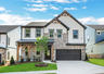 front of 2-story home with light siding and dark accents