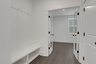mudroom with valet leading to office