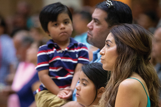 People watching something