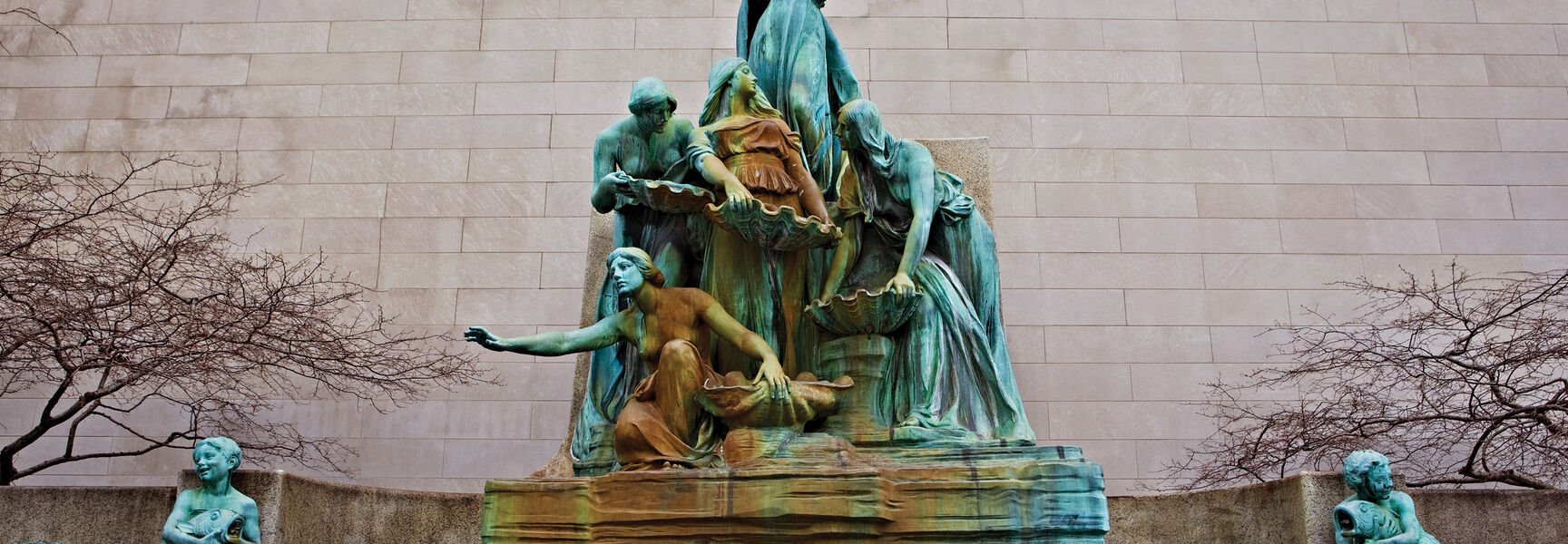 The Fountain of the Great Lakes bronze sculpture in Chicago, representing historic art and architecture, depicts five women pouring water from large shells.