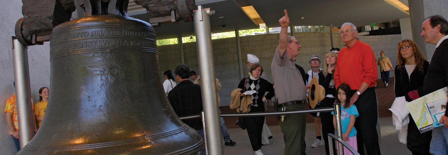 A park ranger teaches a group of grandparents and grandchildren about the Liberty Bell in Philadelphia, Pennsylvania.