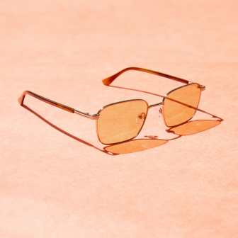 Mandarin tinted lens