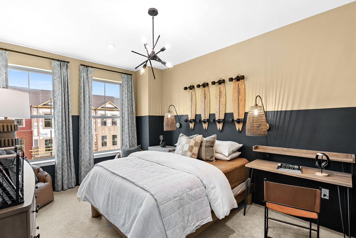 secondary bedroom with a desk