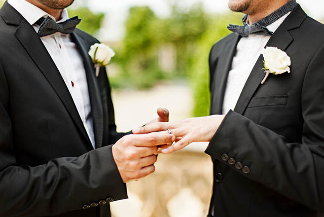 two men getting married